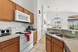 Cozy 4BR Pool Home w/ Game Room Near Disney - Image 5