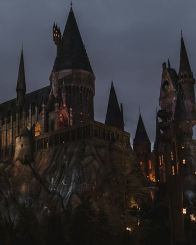 Hogwarts Castle at night in the Wizarding World of Harry Potter