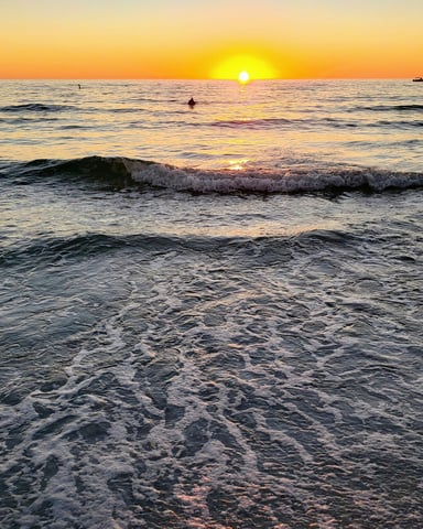 St Pete Beach Florida at sunset with waves